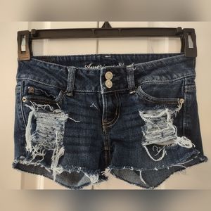 Distressed jean shorts